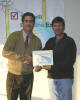 Charles receives his
completion certificate