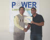 Gregory receives his workshop certificate