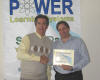 Ned receives his workshop certificate