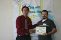Marshall receives his workshop certificate.