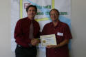 Adrian receives his workshop certificate.