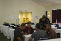 After class ends small group of students stay behind to review conduit fill calculations.