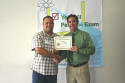 Chris receives his class certificate