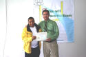 Oscar receives his class certificate