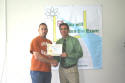 Charles receives his class certificate