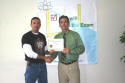 Charles receives his class certificate