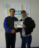 Mel receives his
completion certificate