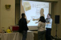 Students review RJ31X jack configuration after class.