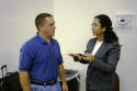 Yvette talks with a student on the morning of the exam.