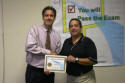 Robert receives his workshop certificate.