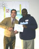 Sanborn receives his
completion certificate