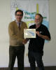 Virgil receives his
completion certificate